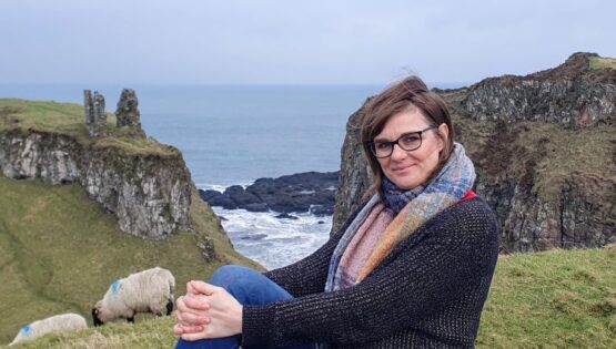Author sitting in typical Irish landscape.