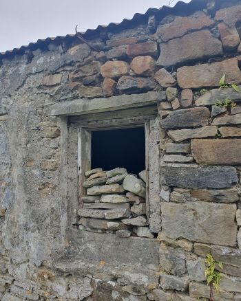 Derelict Cottage Window, closed up with rocks. Co. Galway, Ireland.