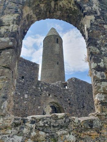 Turlough Roundtower with Arch. Castlebar, Co. Mayo, Ireland.